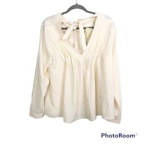The Korner white pleated neckline bow long sleeve blouse size L nwt
